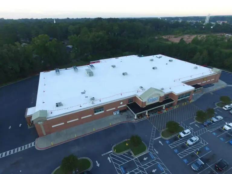 Before and After photos of the Kroger Mule-Hide TPO Roof installation in Dublin, GA.